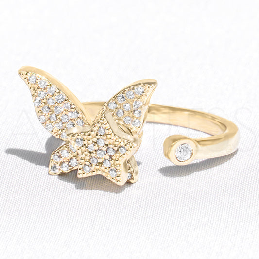 Gold butterfly anxiety ring with star charm, adjustable size, on white background