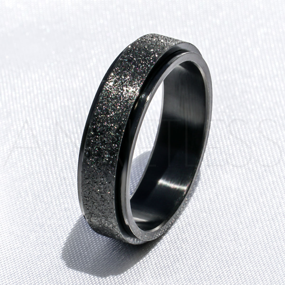 Sparkly Black Anxiety Ring on White Background